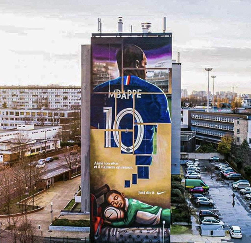 Giant mural of French star Kylian Mbappe on the facade of a building in Bondy, France
Nike
Just do it
