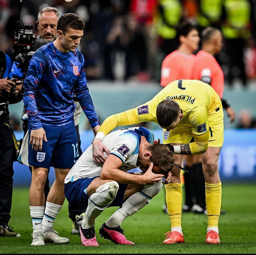 Pickford and Trippier consoling England captain Harry Kane following their side’s quarter-final exit. 