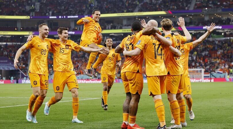 The Netherlands football team celebrate their goal against USA in the 2022 World Cup Round of 16